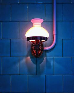 Close-up of illuminated light bulb