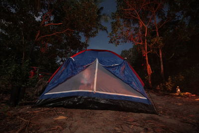 Outdoor camping with firework,stars and moon light