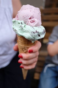 Close-up of woman holding ice cream