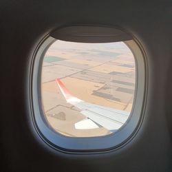 Airplane seen through window