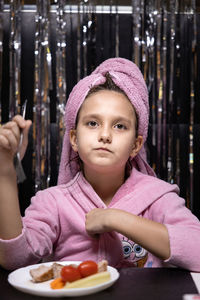 Portrait of girl holding ice cream