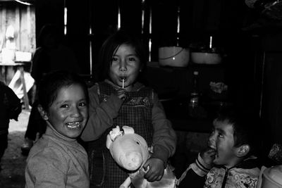 Portrait of a smiling girl with toy