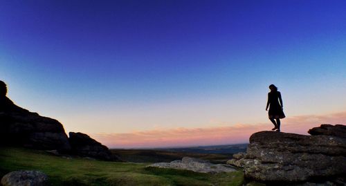 Man standing on rock formation