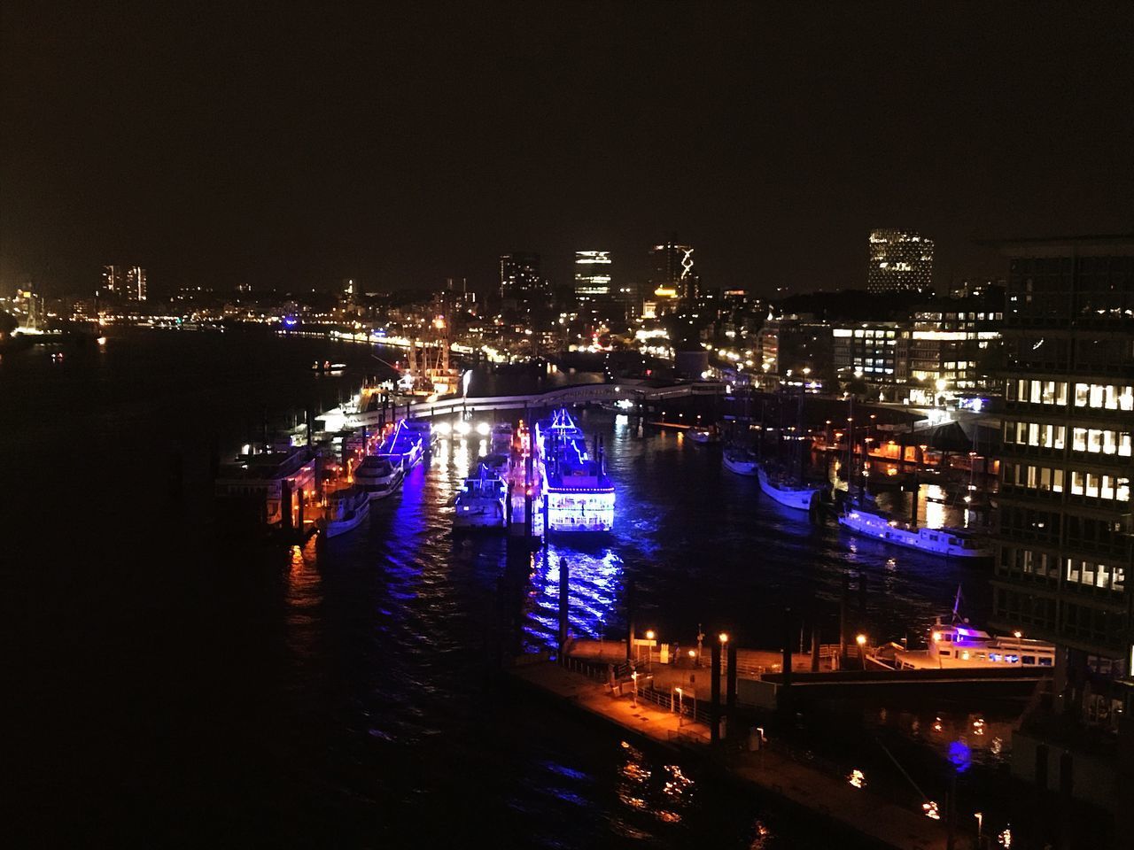 ILLUMINATED BUILDINGS AT NIGHT