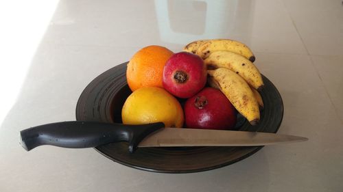 High angle view of fruits in bowl on table