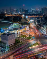High angle view of illuminated city buildings at night