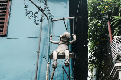 Close-up of statue against trees