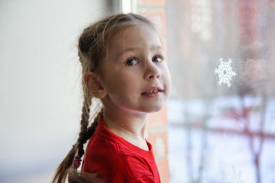 Portrait of a smiling girl looking away