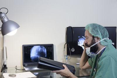 In the medical laboratory, the patient undergoes an mri or ct scan 