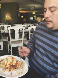 Young woman eating food