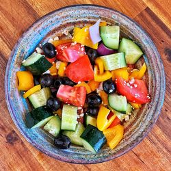 Directly above shot of chopped fruits in bowl on table