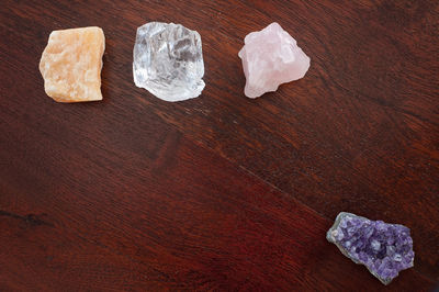 High angle view of rocks on wooden table