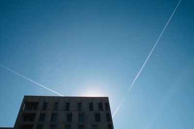 Low angle view of building against blue sky