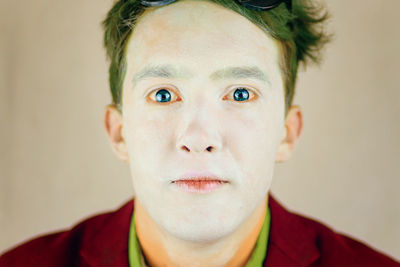 Close-up portrait of serious young man