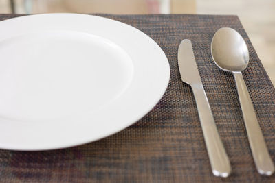 High angle view of empty plate on table