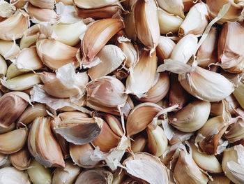 Full frame shot of onions for sale in market