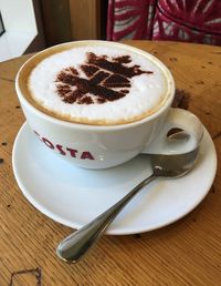 Coffee cup on table