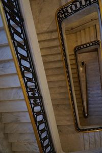 Directly below shot of spiral staircase in building