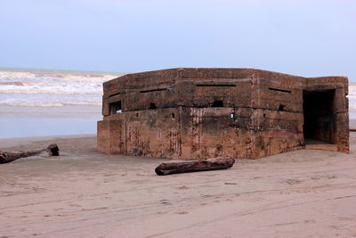 Abandoned structure on the beach