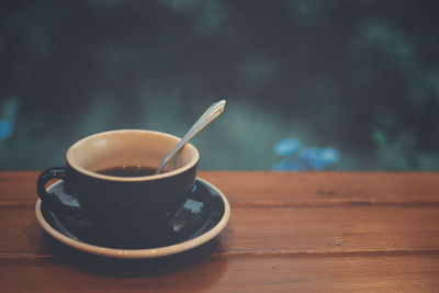 Coffee cup on table