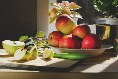 The process of making a homemade apple drink. delicious, fresh and healthy fruits