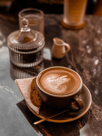 High angle view of coffee cup on table