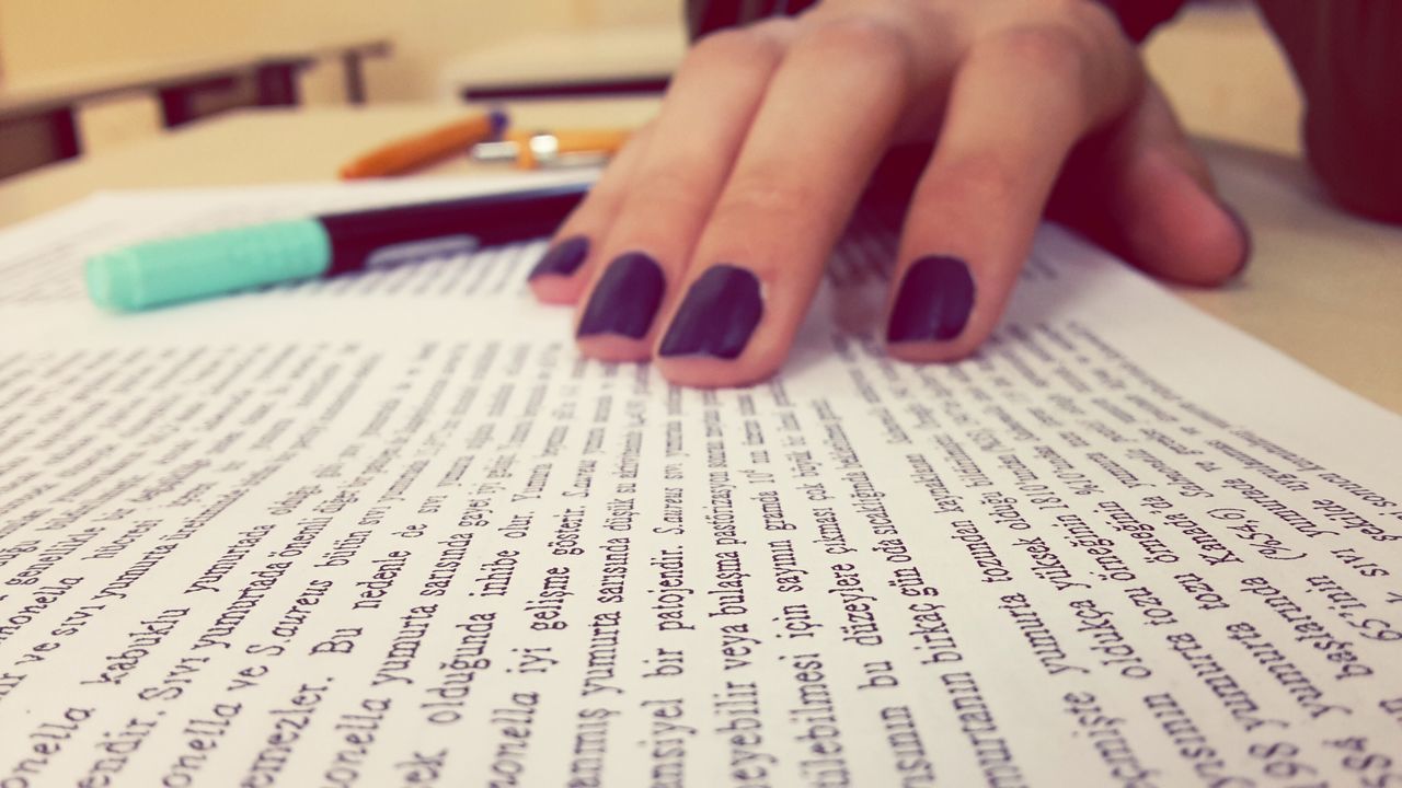 indoors, person, close-up, part of, book, table, paper, education, cropped, human finger, selective focus, communication, pen, holding, focus on foreground, still life, pencil