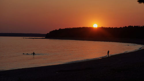 Scenic view of sea against sky during sunset