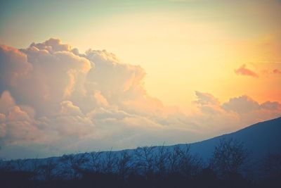 Low angle view of silhouette mountain against sky during sunset