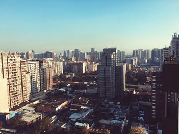 Cityscape against clear sky