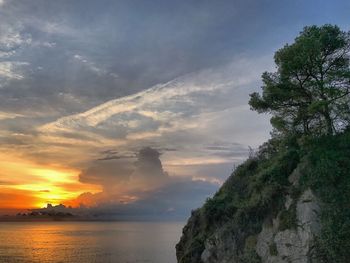 Scenic view of sea against sky at sunset