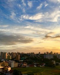 High angle view of buildings against sky during sunset