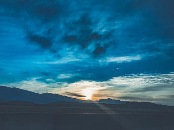 Scenic view of landscape against sky during sunset