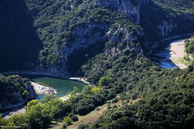 High angle view of ardeche river by mountain