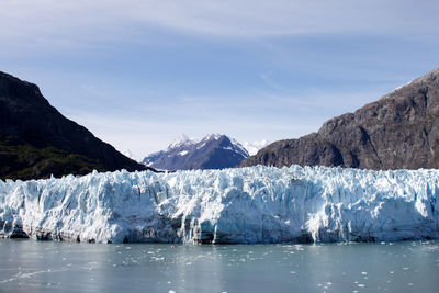 Frozen river against sky at glacier bay national park