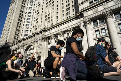 Group of people in front of building