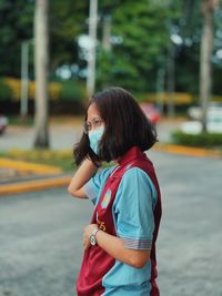 Side view of woman standing