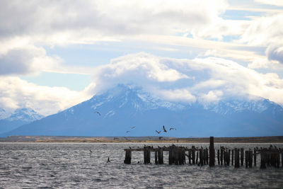 Scenic view of snowcapped mountains against sky