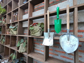 Plastic toy hanging on shelf at home