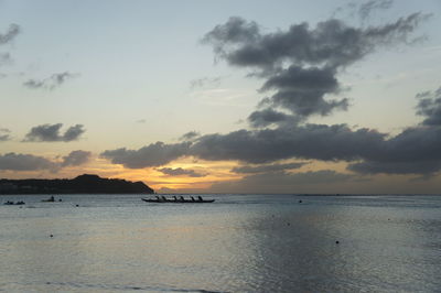 Scenic view of calm sea at sunset