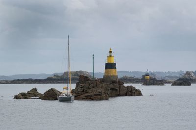 Ship in sea against sky