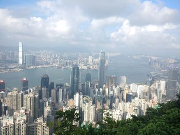 Aerial view of cityscape against sky