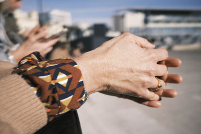 Cropped hand of woman holding hands