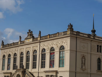 Low angle view of historic building against sky