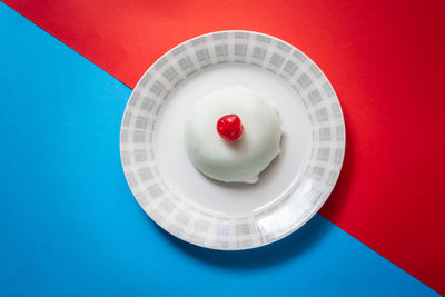 High angle view of red fruit on table