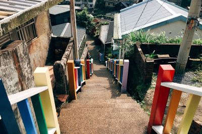 Staircase amidst buildings in city