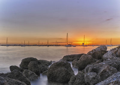 Scenic view of sea against sky during sunset