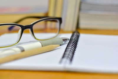 Close-up of eyeglasses on table