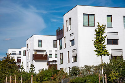 New building area with white apartment houses seen in berlin, germany