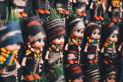 Close-up of toys for sale at market stall